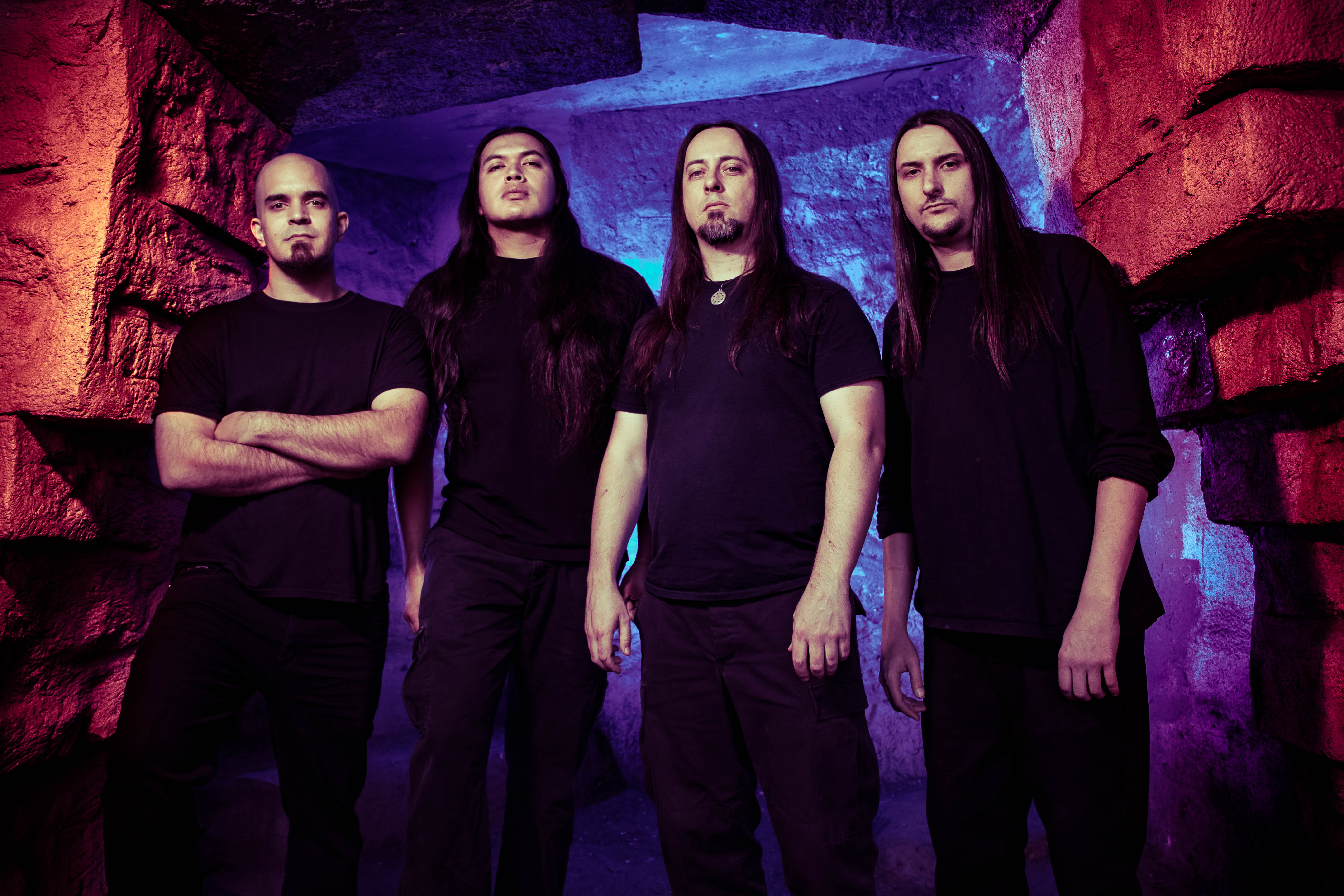 Abysmal Dawn — four members standing in a cold, violet-lit stone cavern.